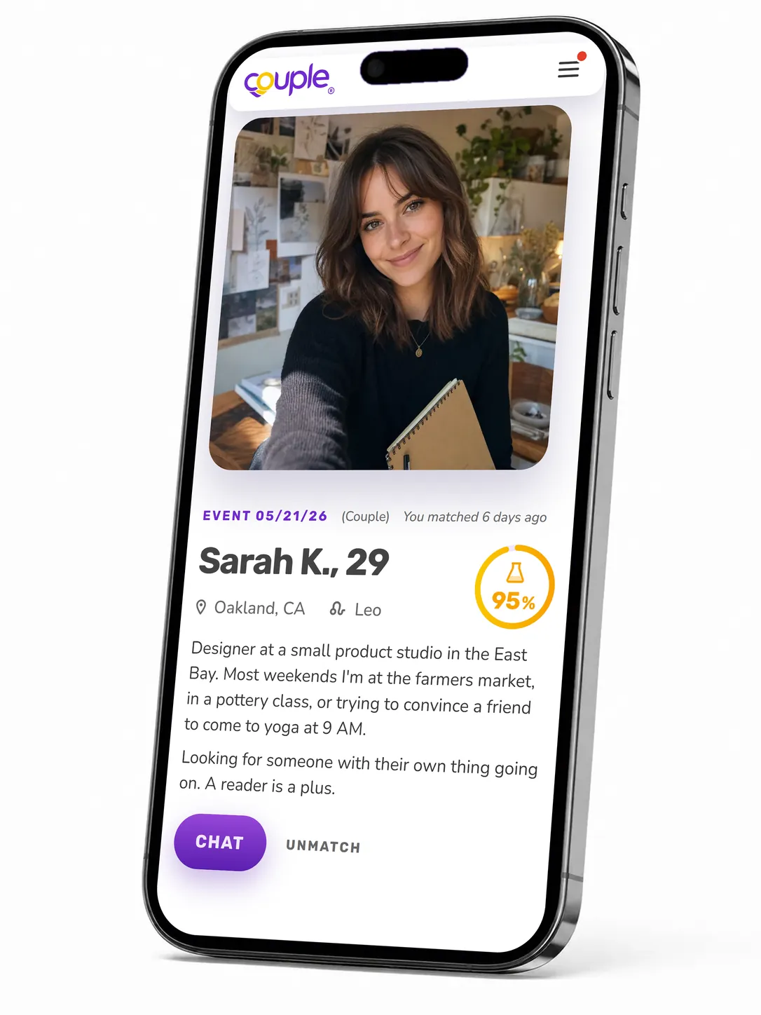 A Couple match profile open on a phone, showing its chemistry score